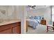 Bedroom with a queen bed and en-suite bathroom at 104 Johnston Farm Ln, Woodstock, GA 30188