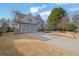Brick front elevation of a charming two-story home at 104 Johnston Farm Ln, Woodstock, GA 30188