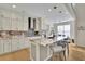 Modern kitchen with granite countertops and stainless steel appliances at 104 Johnston Farm Ln, Woodstock, GA 30188