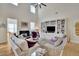Spacious living room with built-in shelving and a fireplace at 104 Johnston Farm Ln, Woodstock, GA 30188