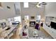 High-ceiling living room with open floor plan at 104 Johnston Farm Ln, Woodstock, GA 30188