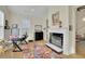 Living room with fireplace and built-in shelving at 104 Johnston Farm Ln, Woodstock, GA 30188