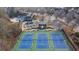 Community tennis courts with ample parking nearby at 104 Johnston Farm Ln, Woodstock, GA 30188