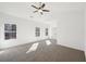 Spacious main bedroom with wall-to-wall carpet and ample natural light at 3279 Greenhill Dr, Villa Rica, GA 30180