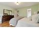 Bedroom with hardwood floors and built-in dresser at 518 Hill Se St, Atlanta, GA 30312