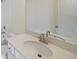 Bathroom boasts an oval sink, quartz countertop and large mirror at 5430 Crow Dr, Cumming, GA 30041