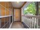 Private balcony with white railing and view of trees at 5641 Roswell Rd # 103, Atlanta, GA 30342