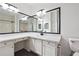 Bathroom with double vanity and corner mirror at 5641 Roswell Rd # 103, Atlanta, GA 30342