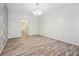 Bright dining room features wood-look floors and accent wall at 5641 Roswell Rd # 103, Atlanta, GA 30342
