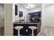 Modern kitchen with dark blue cabinets and granite countertops at 5641 Roswell Rd # 103, Atlanta, GA 30342