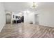 Open concept living room, kitchen, and access to patio at 5641 Roswell Rd # 103, Atlanta, GA 30342