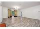 Spacious living room with hardwood floors and sliding door at 5641 Roswell Rd # 103, Atlanta, GA 30342