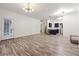 Open concept living room and kitchen with hardwood floors at 5641 Roswell Rd # 103, Atlanta, GA 30342