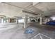 Covered parking garage with designated spaces at 5641 Roswell Rd # 103, Atlanta, GA 30342