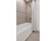 Clean bathroom with a shower and tub at 6075 Marigold Way, Atlanta, GA 30349