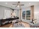 Bright office features hardwood floors, large window, and stylish furnishings at 6075 Marigold Way, Atlanta, GA 30349
