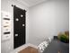 Home office with black magnetic board and built-in shelves at 6075 Marigold Way, Atlanta, GA 30349