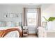 Spacious bedroom with hardwood floors, window, and neutral decor at 1618 Athens Sw Ave, Atlanta, GA 30310