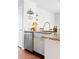Modern kitchen with stainless steel dishwasher and granite countertops at 1618 Athens Sw Ave, Atlanta, GA 30310