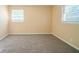 Simple bedroom with neutral walls and carpeting at 2725 Rainbow Forest Dr, Decatur, GA 30034