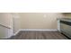 Kitchen dining area with wood-look floors and neutral walls at 2725 Rainbow Forest Dr, Decatur, GA 30034