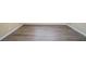 Wood-look floors in a neutral-toned room at 2725 Rainbow Forest Dr, Decatur, GA 30034