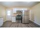 Modern kitchen featuring stainless steel appliances and granite countertops at 2725 Rainbow Forest Dr, Decatur, GA 30034