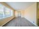 Bright living room with large windows and wood-look floors at 2725 Rainbow Forest Dr, Decatur, GA 30034