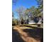 House backyard with trees and grass at 678 Charlotte Nw Pl, Atlanta, GA 30318