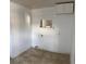 Kitchen with white cabinets and a window at 678 Charlotte Nw Pl, Atlanta, GA 30318