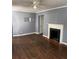 Living room with hardwood floors and fireplace at 678 Charlotte Nw Pl, Atlanta, GA 30318