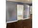Living room with hardwood floors and view of another room at 678 Charlotte Nw Pl, Atlanta, GA 30318