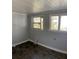 Spare bedroom with gray walls and vinyl flooring at 678 Charlotte Nw Pl, Atlanta, GA 30318