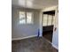 Bright sunroom with tile flooring and view of backyard at 678 Charlotte Nw Pl, Atlanta, GA 30318