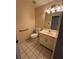 Neutral half bathroom featuring a toilet, vanity, and handrails at 143 Tracy Ln, Mcdonough, GA 30253