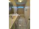 Well-maintained bathroom featuring a shower-tub combination and a classic vanity at 143 Tracy Ln, Mcdonough, GA 30253