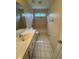 Neutral toned bathroom equipped with vanity, mirror, shower and tub at 143 Tracy Ln, Mcdonough, GA 30253