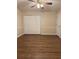 Spacious bedroom showcasing a convenient closet, chair rail and ample natural light at 143 Tracy Ln, Mcdonough, GA 30253