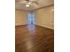 Spacious bedroom with hardwood floors, windows and ceiling fan at 143 Tracy Ln, Mcdonough, GA 30253