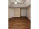 Spacious bedroom with hardwood floors, windows and ceiling fan at 143 Tracy Ln, Mcdonough, GA 30253