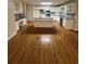 A spacious kitchen, perfect for cooking and Gathering gatherings, with wood flooring at 143 Tracy Ln, Mcdonough, GA 30253