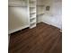 Bright walk-in closet featuring extensive built-in shelving and ample hanging space at 143 Tracy Ln, Mcdonough, GA 30253