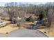 House with driveway and landscaping, aerial view at 4280 Talaton Ct, Cumming, GA 30028