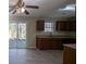 Kitchen with dark brown cabinets, granite countertops, and black appliances at 4326 Dogwood Farms Dr, Decatur, GA 30034