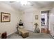 Relaxing bedroom with a sitting area and access to another room at 3805 Dogwood Farm Rd, Decatur, GA 30034