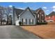 Two-story house with driveway and landscaping at 3805 Dogwood Farm Rd, Decatur, GA 30034