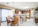 Kitchen features dark wood cabinets, a breakfast area, and tile floor at 3805 Dogwood Farm Rd, Decatur, GA 30034