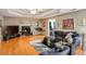 Living room with hardwood floors, fireplace, and comfortable seating at 3805 Dogwood Farm Rd, Decatur, GA 30034