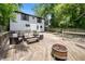 Deck with firepit and seating area in a private backyard at 930 White St, Atlanta, GA 30310