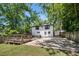 Home's rear elevation, showcasing a deck and fenced-in backyard at 930 White St, Atlanta, GA 30310
